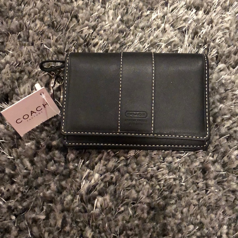 Black leather coach wallet.